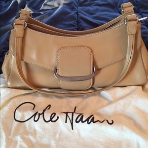 Tan Small/Medium size Cole Haan purse